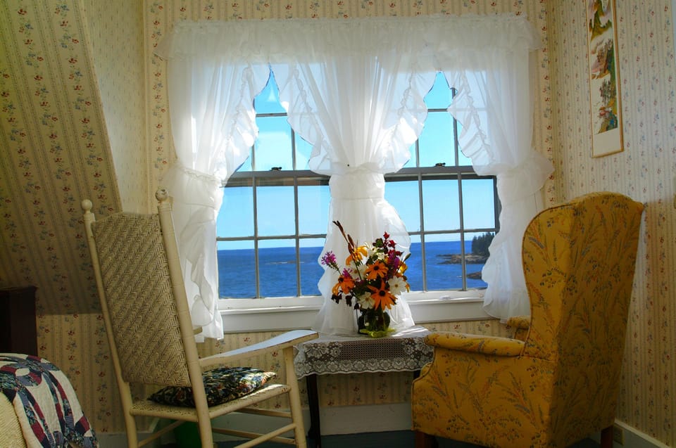 Bedroom 4 with queen bed, private bath. Great view of ocean and  our sandy beach