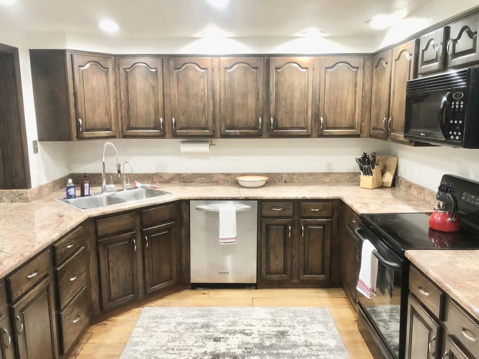 Open kitchen design with all of the essentials and plenty of storage 