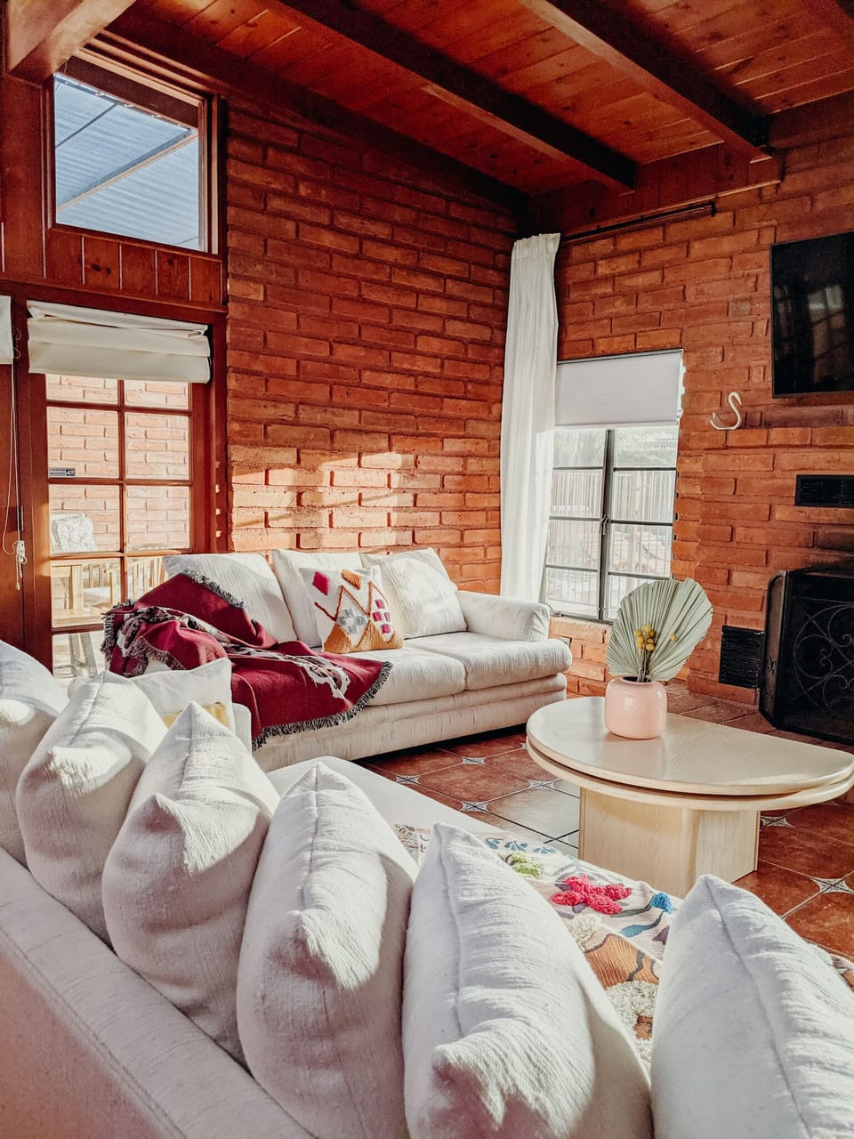 Large sofa can be made into a bed with memory foam pad and linens. 