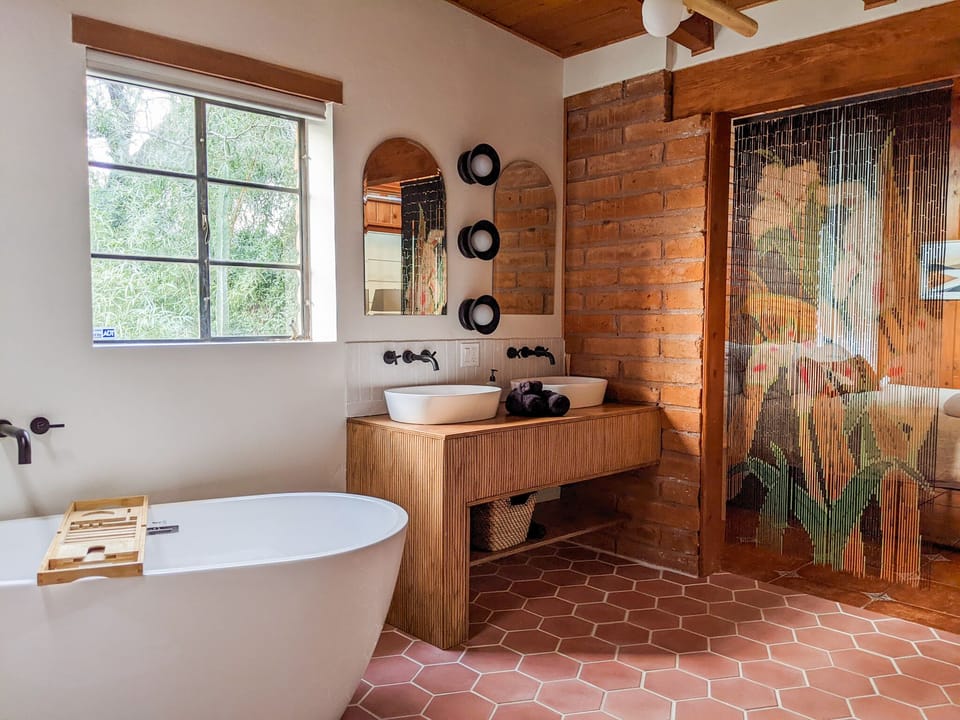 En Suite Master Bathroom with freestanding tub and shower.