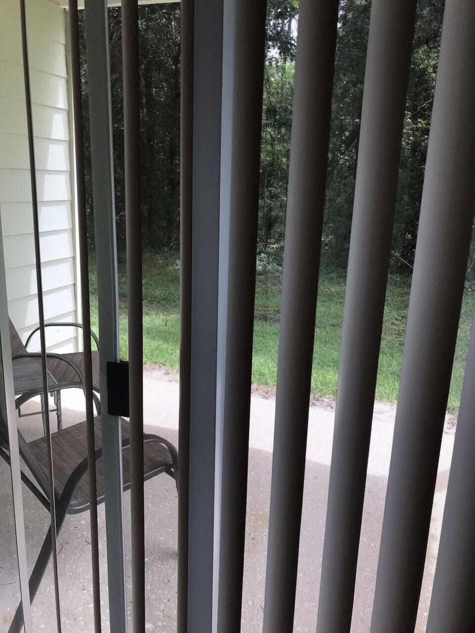 Walk out private patio facing woods.