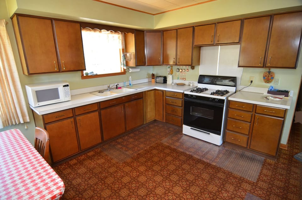 Room, Multiple Beds, Patio, Beach View | Private kitchen | Fridge, microwave, oven, stovetop