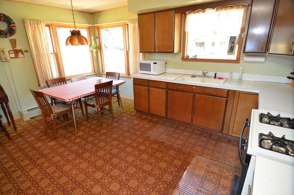 Room, Multiple Beds, Patio, Beach View | Private kitchen | Fridge, microwave, oven, stovetop