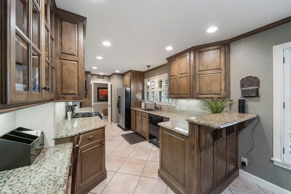 Off of the main entry the galley style kitchen is very well appointed.