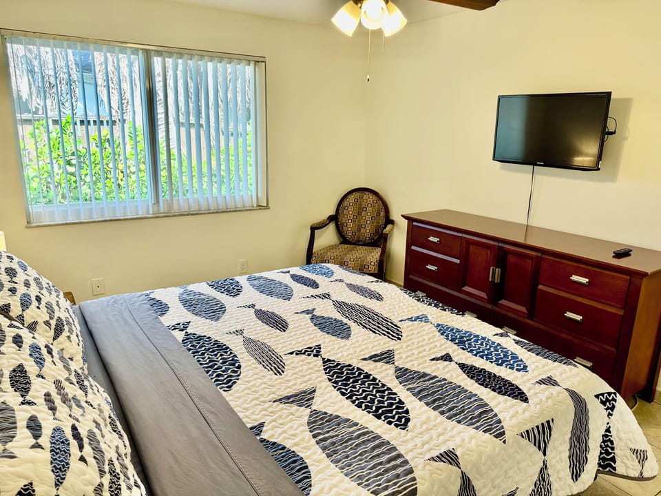 Primary bedroom with comfortable king-size bed. 