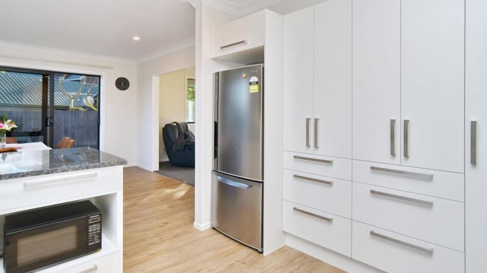 A full-size fridge-freezer and plenty of cupboard space for a proper shop, made for longer stays.