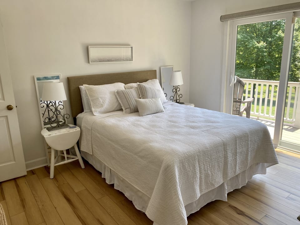 Morning light - Queen Bedroom #1 with lake views.