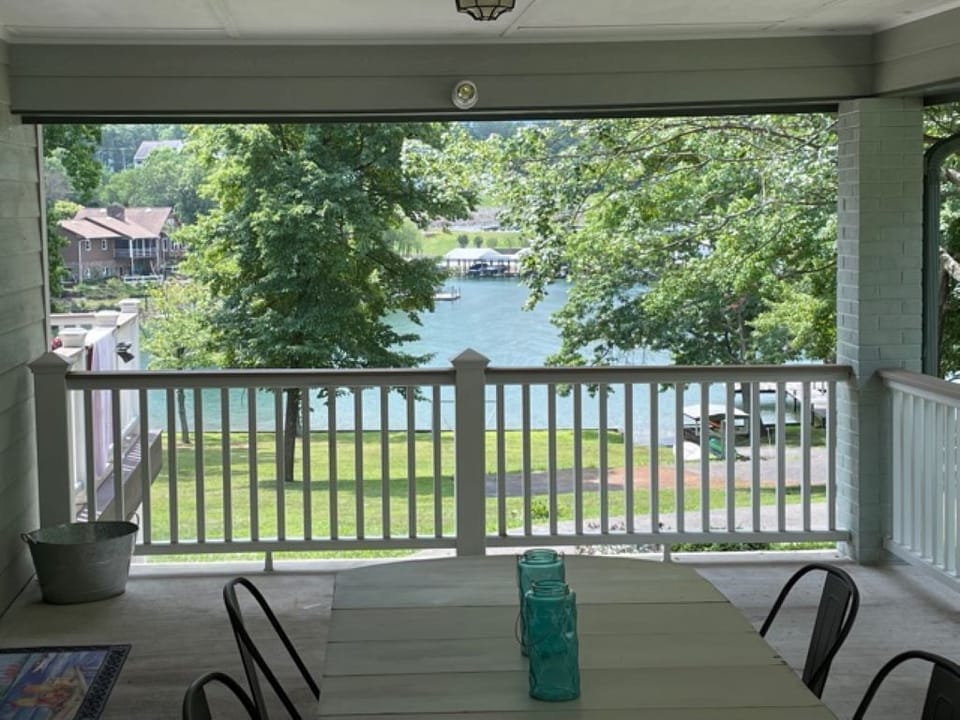 View from favorite dining spot just off kitchen & with lake views on both sides.