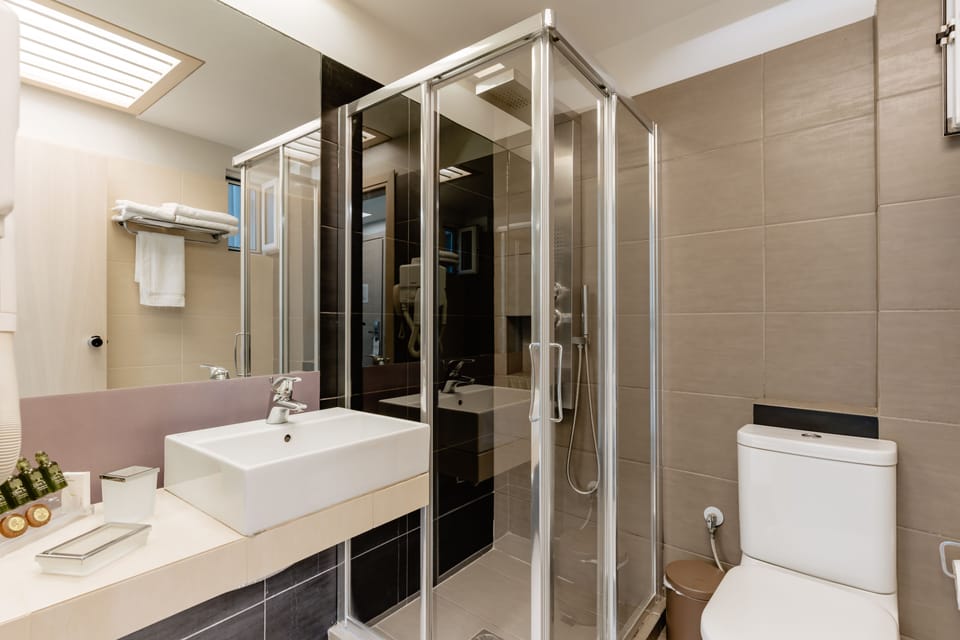 Shower, free toiletries, hair dryer, slippers