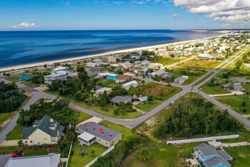 Aerial view of Mexico Beach with the red star indicating location of the property.