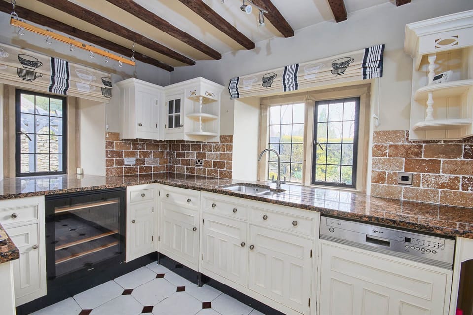 Ground floor: Well equipped separate kitchen with granite worktops