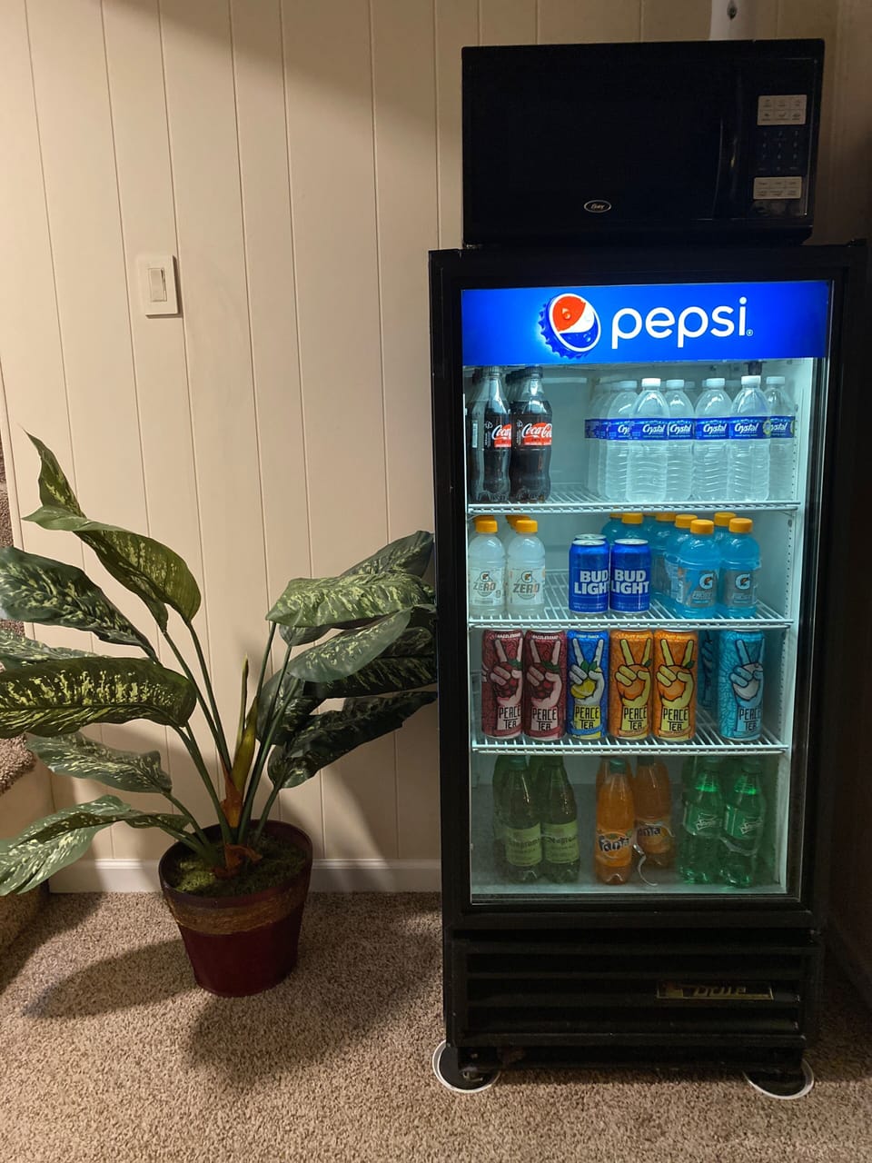 Keep your drinks cold & microwave your popcorn in the den..