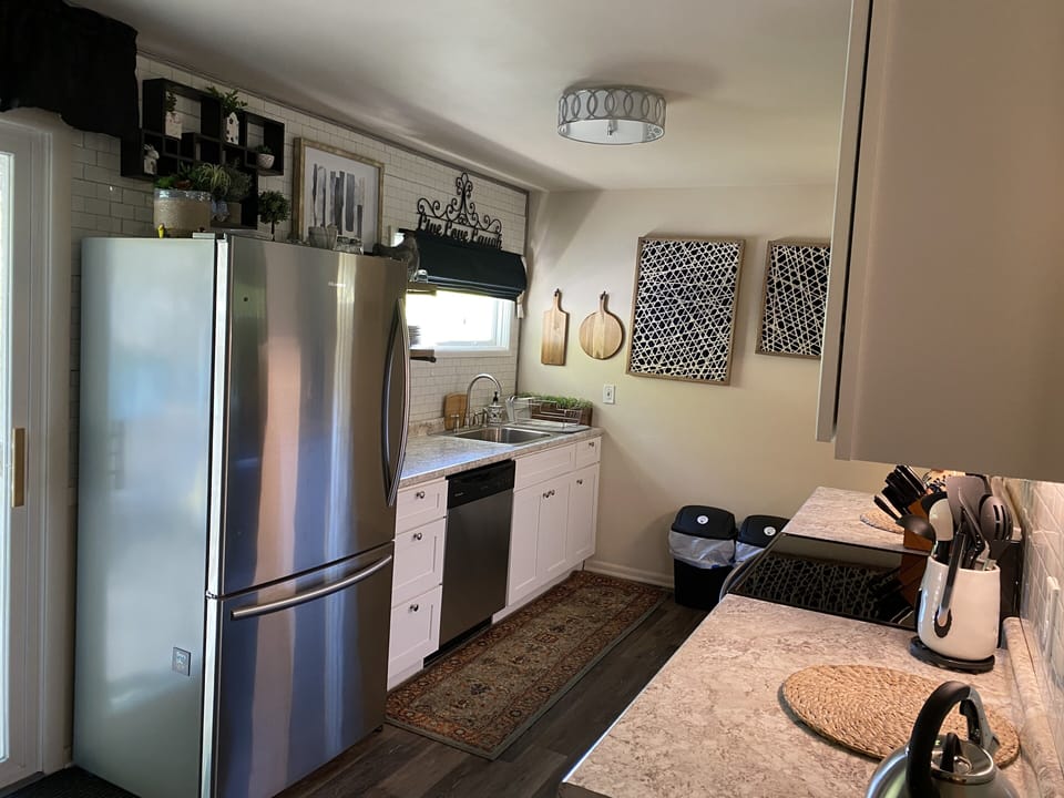 Kitchen. Fully stocked! Down to spices. Just bring your food/groceries.