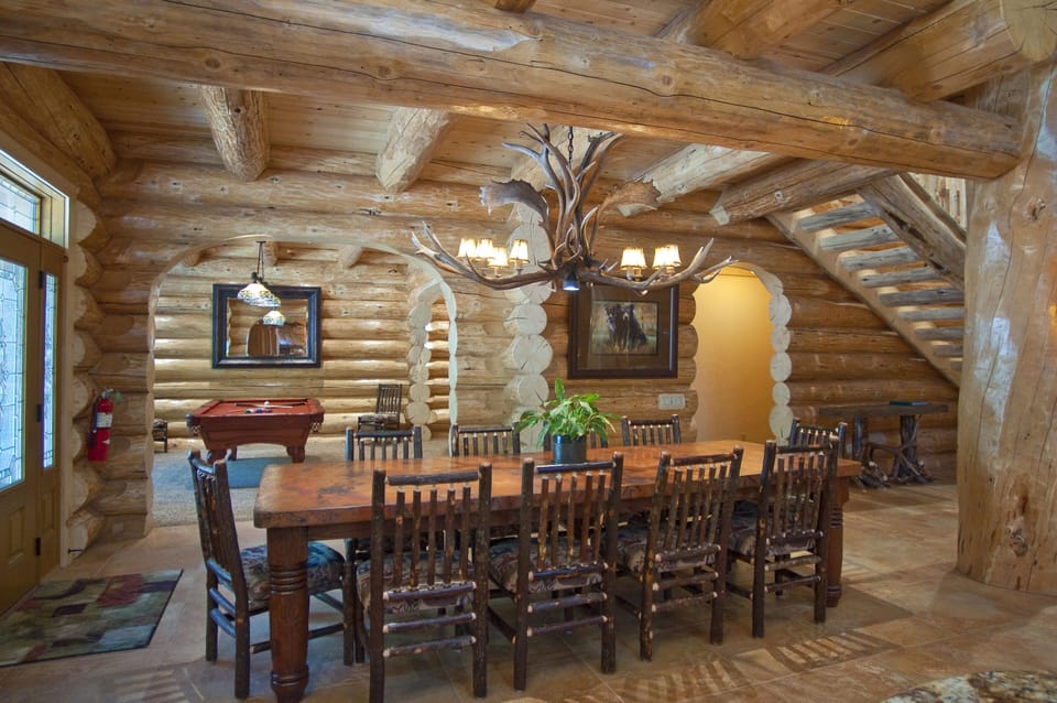 The dining area has a copper topped dining room table that seats 12.