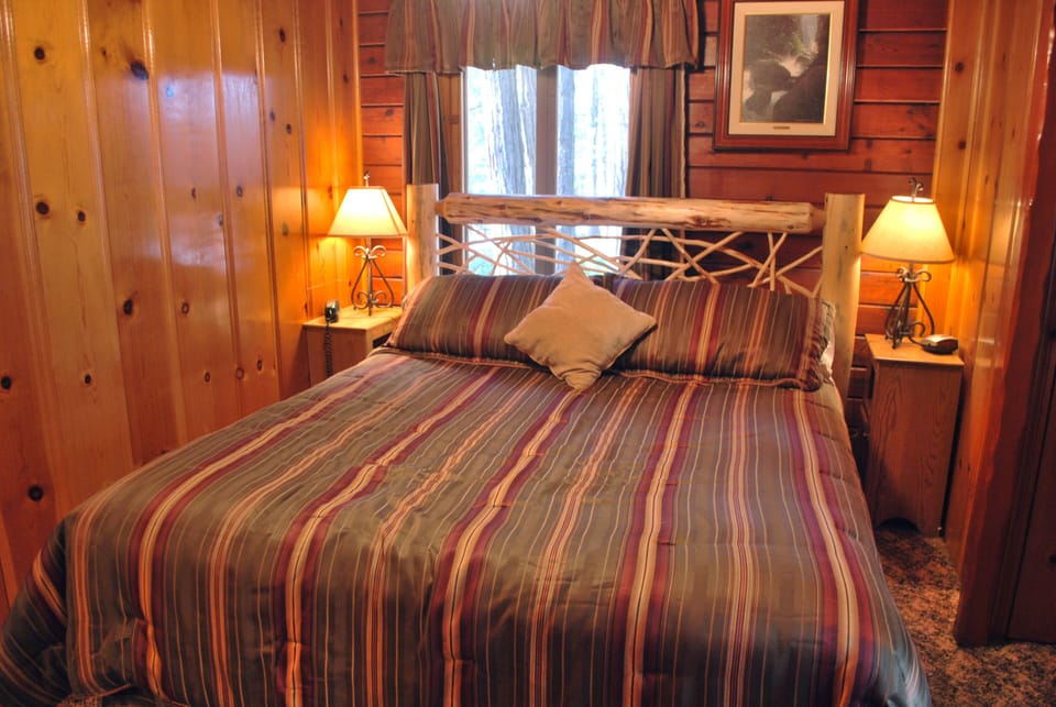 Master bathroom with king bed and attached 3/4 bathroom