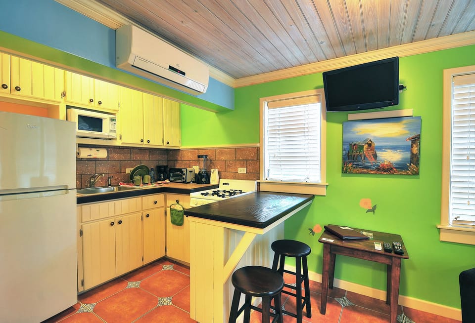 Full kitchen with everything you need to cook full meals and dine at counter.