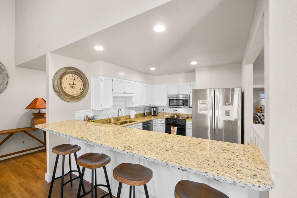 Gorgeous open concept kitchen with additional 4 seating at the counter.