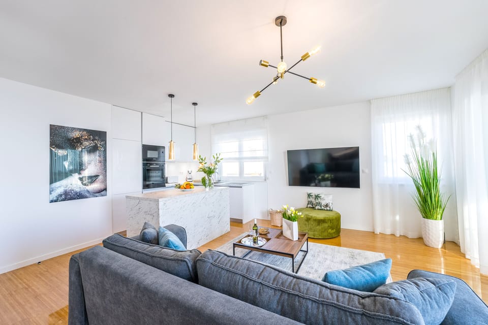 Deluxe Apartment, 3 Bedrooms, Hot Tub, Sea View | Living area | 55-inch LCD TV with satellite channels, TV, DVD player
