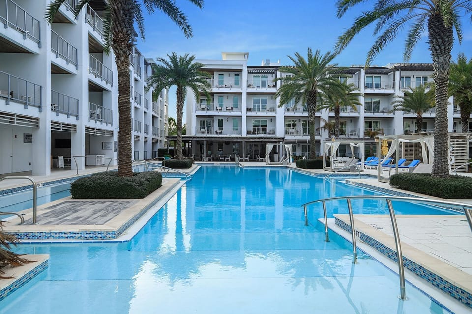 The resort style pool is seasonally heated and features private