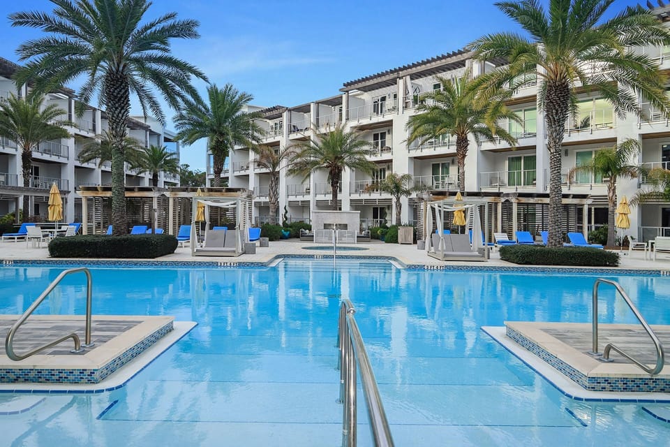 The resort style pool is seasonally heated and features private