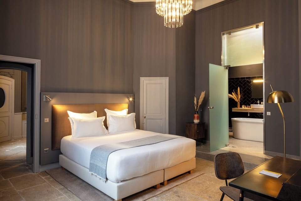 Executive Suite | Memory foam beds, in-room safe, individually decorated