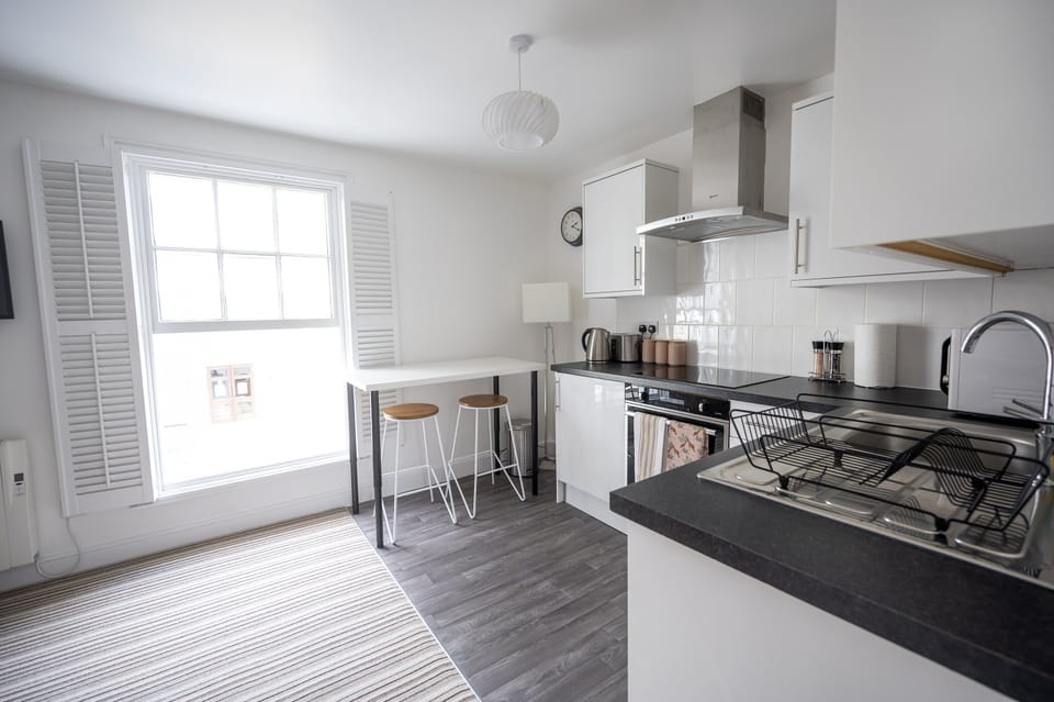 Lots of natural light in the living room/ kitchen.