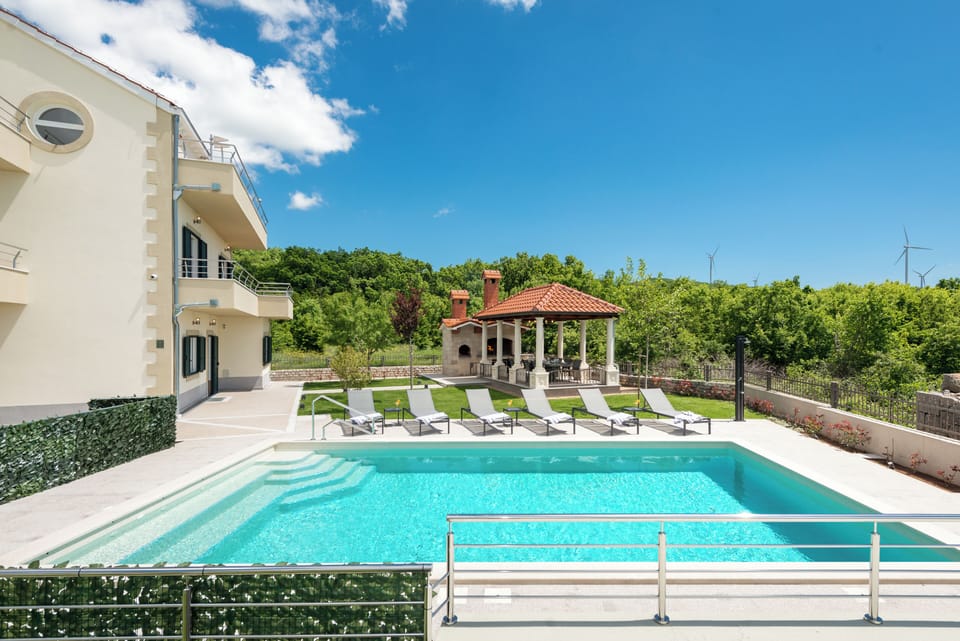 Seasonal outdoor pool, sun loungers