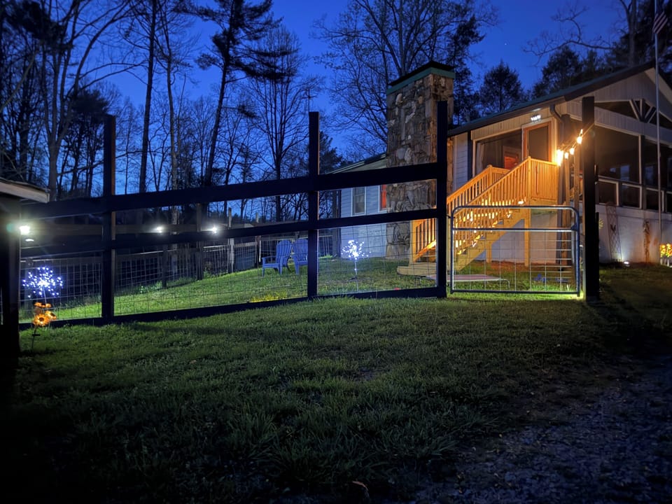 Private and secure pup park connected to screen porch/cabin.