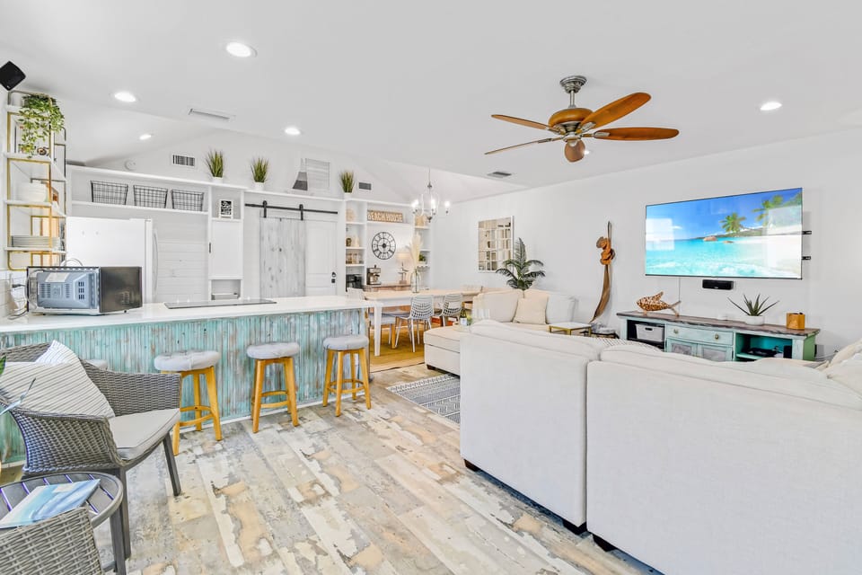 Bright open concept living/kitchen/dining; seating for 10, island + dining table