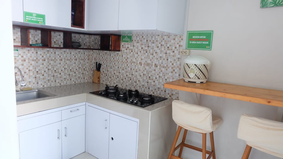 Family Villa | Private kitchen | Full-size fridge, stovetop, electric kettle, cookware/dishes/utensils