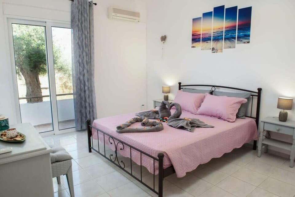 Revel in comfort on the cozy double bed, offering a tranquil haven for rest and relaxation