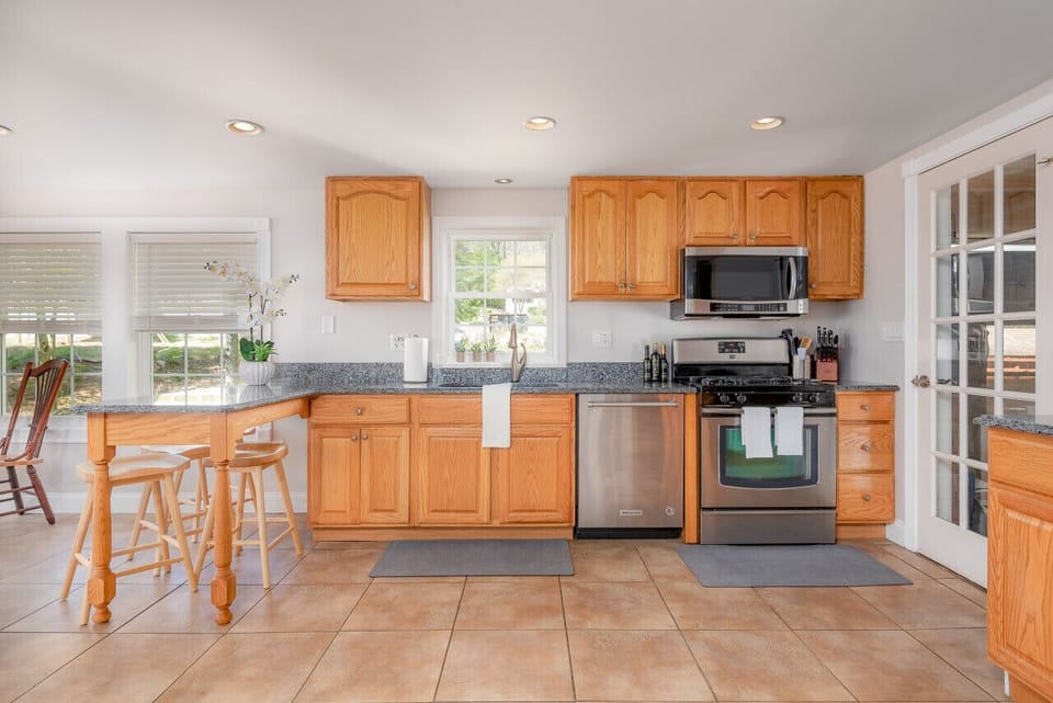 Our spacious and modern kitchen is perfect for hosting intimate dinners or preparing a feast for your loved ones.