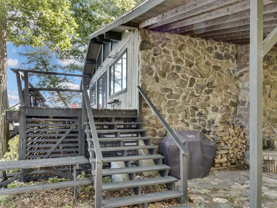Kayak and paddle boards are stored under the back deck