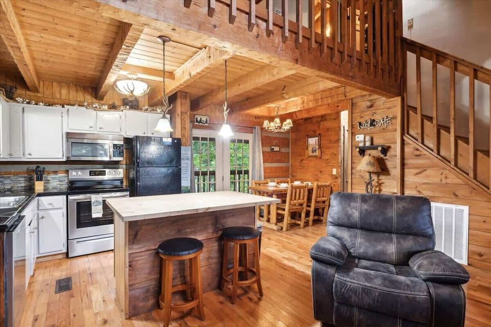 Kitchen & Dining: Bright space with wooden charm, modern appliances, and easy outdoor access!
