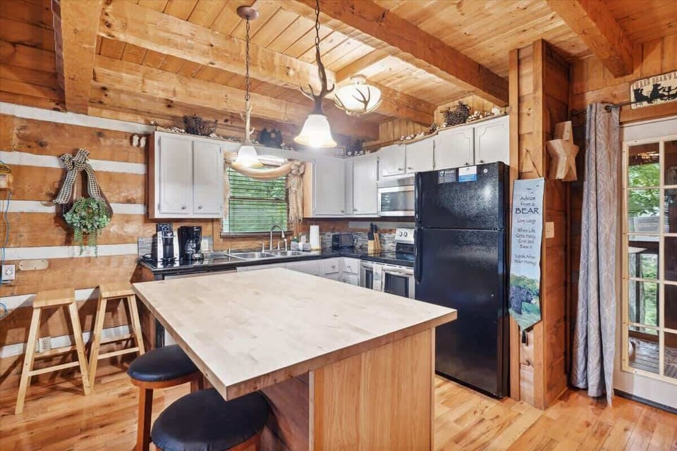 Rustic charm meets modern convenience in this inviting cooking haven!
