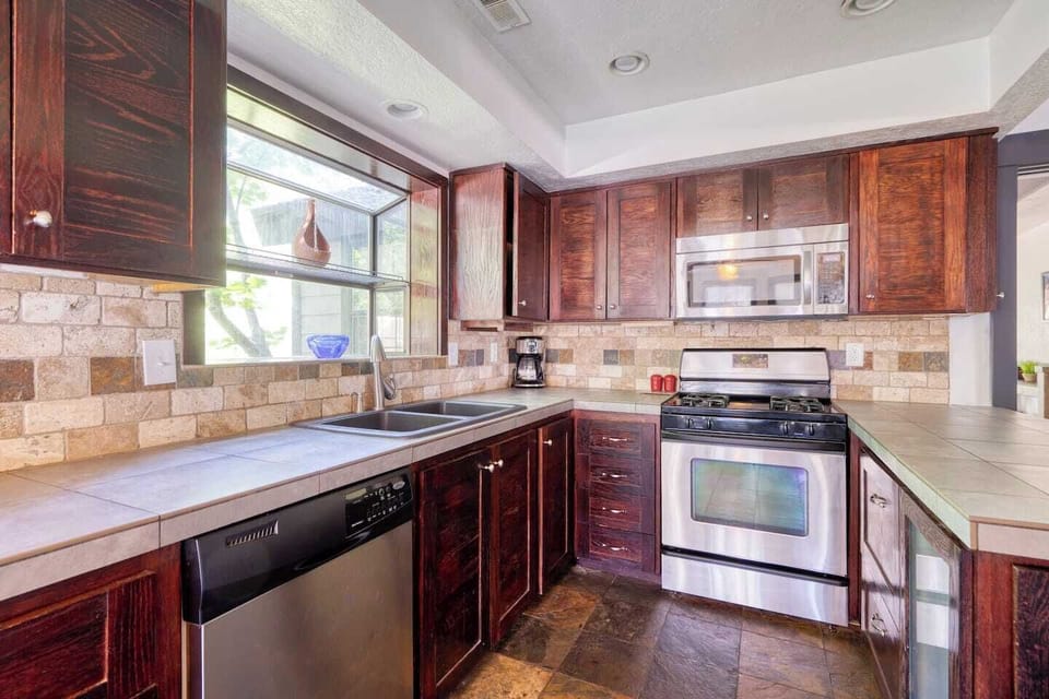 Generously stocked with utensils, pots, pans and bakeware. Coffee maker, toaster, blender, griddle.