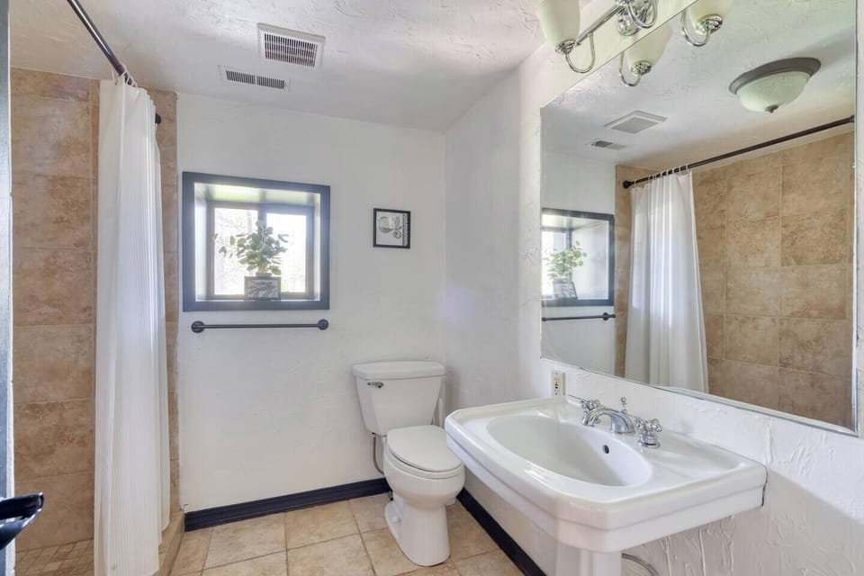 Full Bathroom off of dining room, downstairs. (bathroom #1)
Large tiled shower.