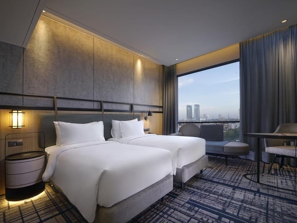 Deluxe Twin Room, City View | Premium bedding, minibar, in-room safe, desk