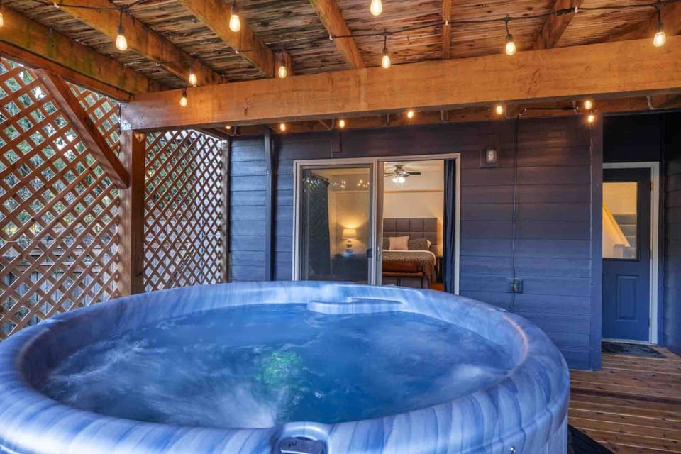 "Spacious home with great views. The beds were very comfortable, the kitchen was well stocked and the hot tub was clean and worked great." - Laura