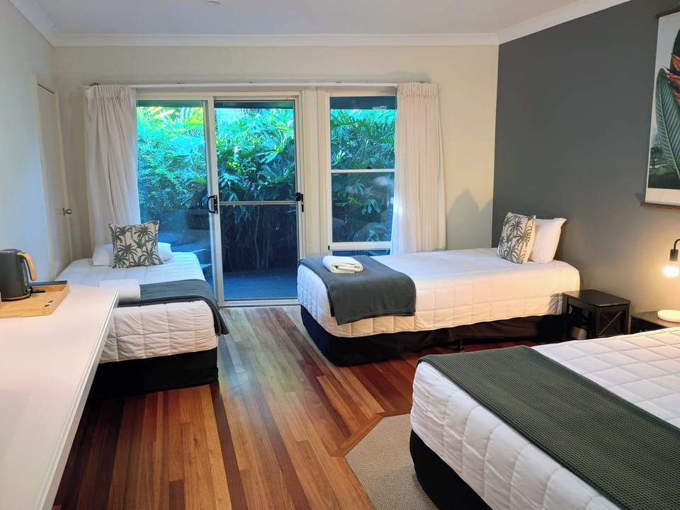 Family Room, Garden View | Premium bedding, desk, laptop workspace, iron/ironing board