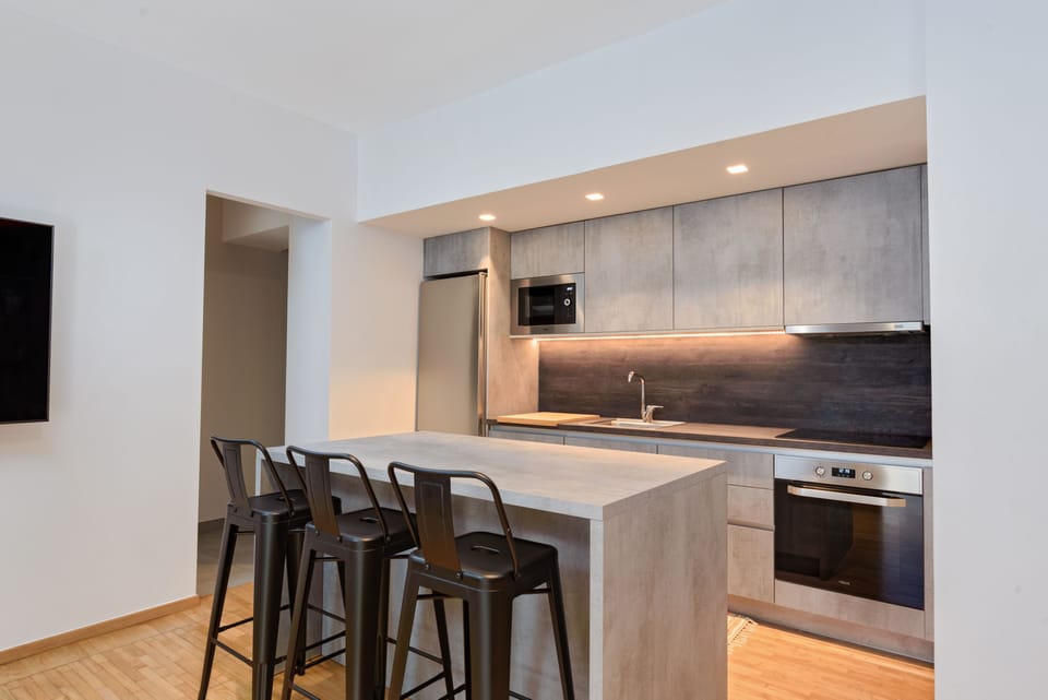 City Apartment, 1 Bedroom, Balcony | Private kitchen | Full-size fridge, microwave, oven, dishwasher
