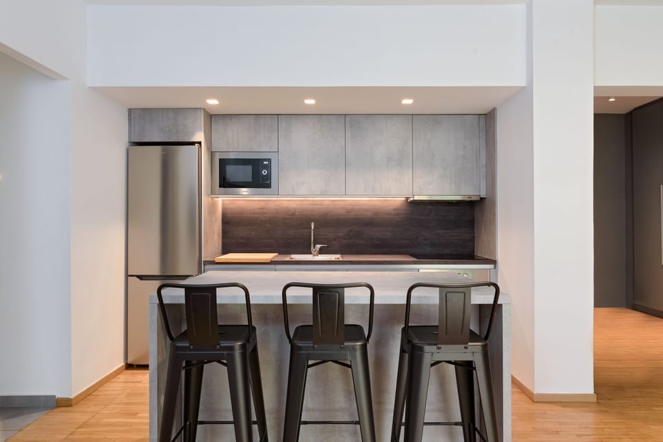 City Apartment, 1 Bedroom, Balcony | Private kitchen | Full-size fridge, microwave, oven, dishwasher