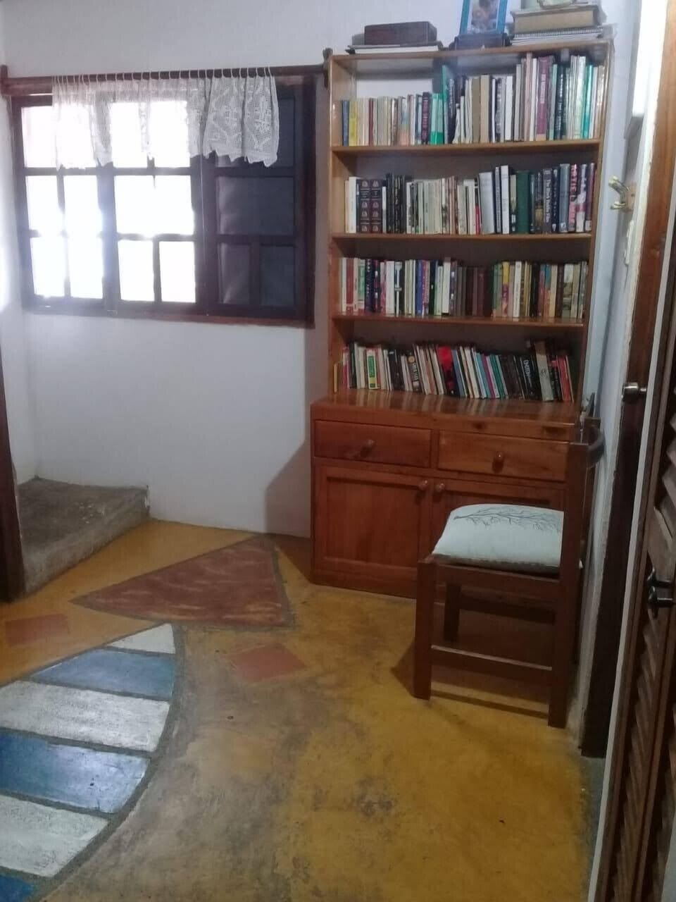 Main room dressing area with bilingual library