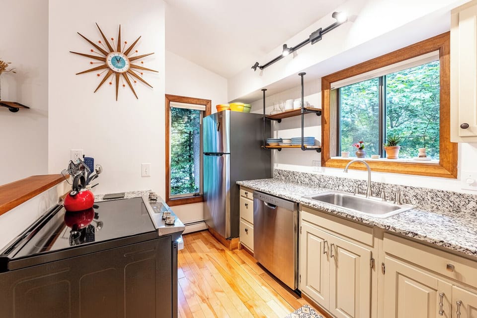 Fully stocked kitchen with new appliances.