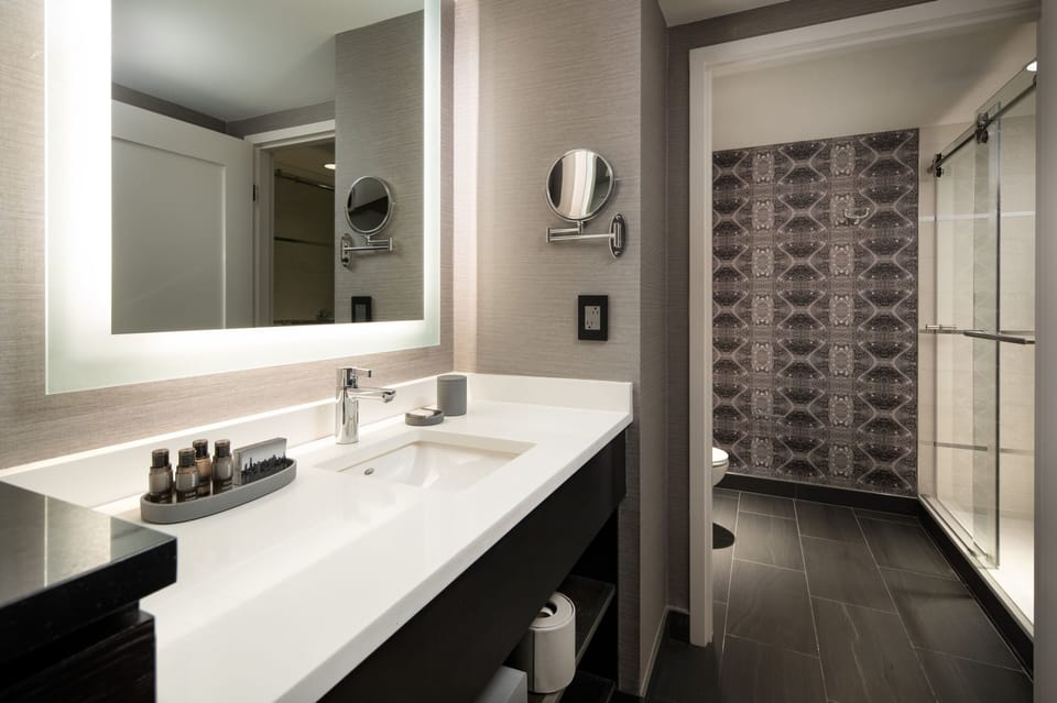 Combined shower/tub, eco-friendly toiletries, hair dryer, bathrobes