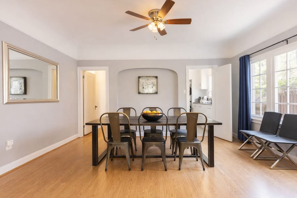 Bright dining space with seating for shared meals, remote work, or planning your LA adventures