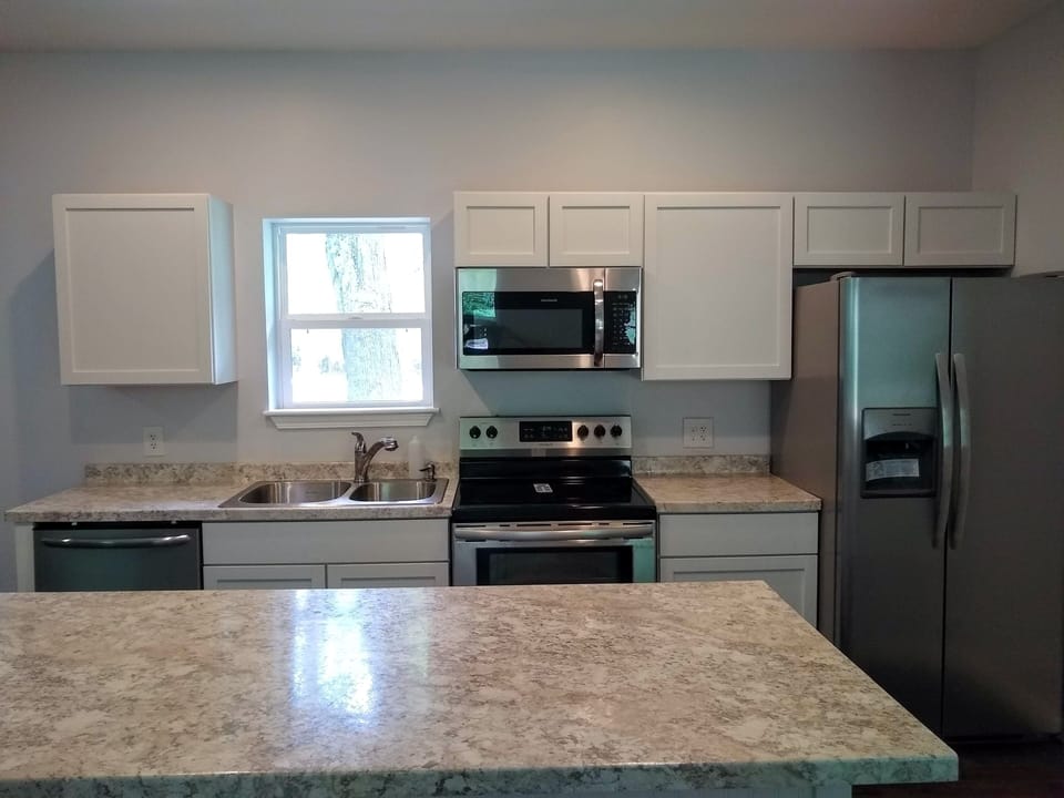  Full-size appliance including dishwasher and ice/water refrigerator.   