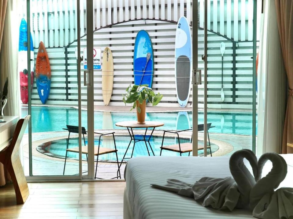 Deluxe Double Room, Pool Access | Premium bedding, in-room safe, desk, laptop workspace