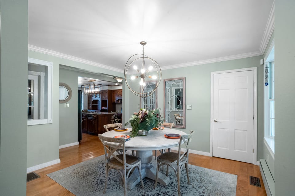 Dining area looks out into the backyard. You might catch a glimpse of deers. 