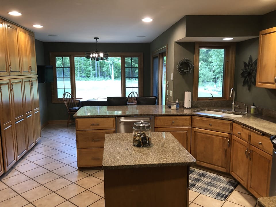 Kitchen also features seating for four and TV monitor
